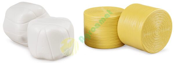 Baloturi de fân presate (negre şi galbene)